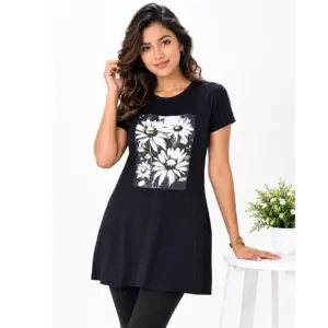 Model wearing Lillithe Essentials black long T-shirt with daisy floral print, paired with black leggings