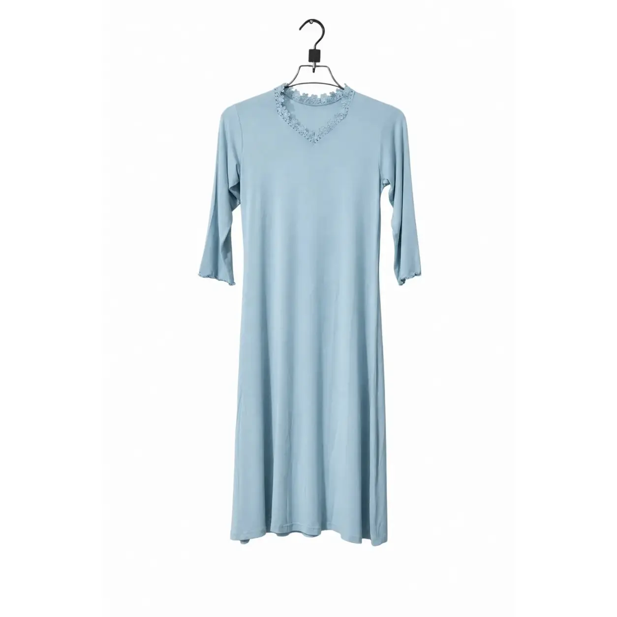 Lillithe combo offer: woman wearing the Serene Lace-Trim Midi Dress in powder blue with off-white Soft-Drape Wide-Leg Pants on a rooftop at sunset. 2-piece set for ৳1,999.