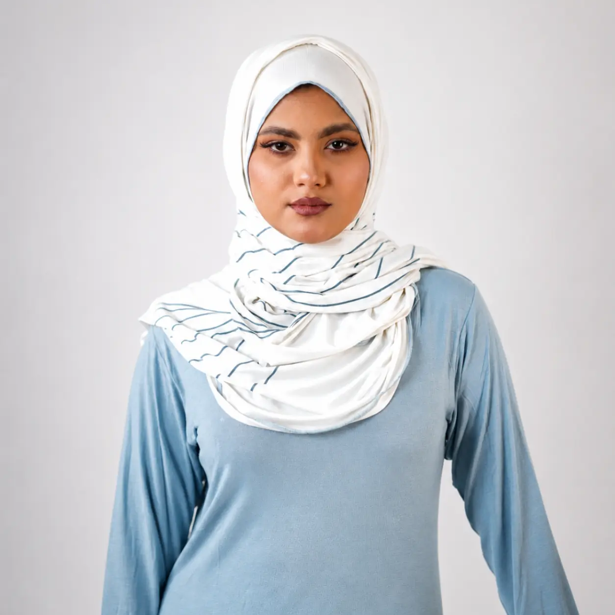 Off-white Linear Wave Dupatta in viscose knit with grey wave line print and tassels, draped for display – Lillithe